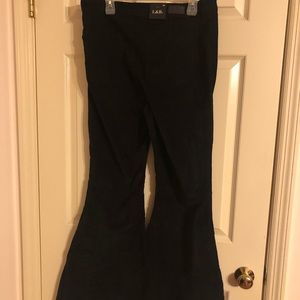 Black corduroy flares with frayed hem